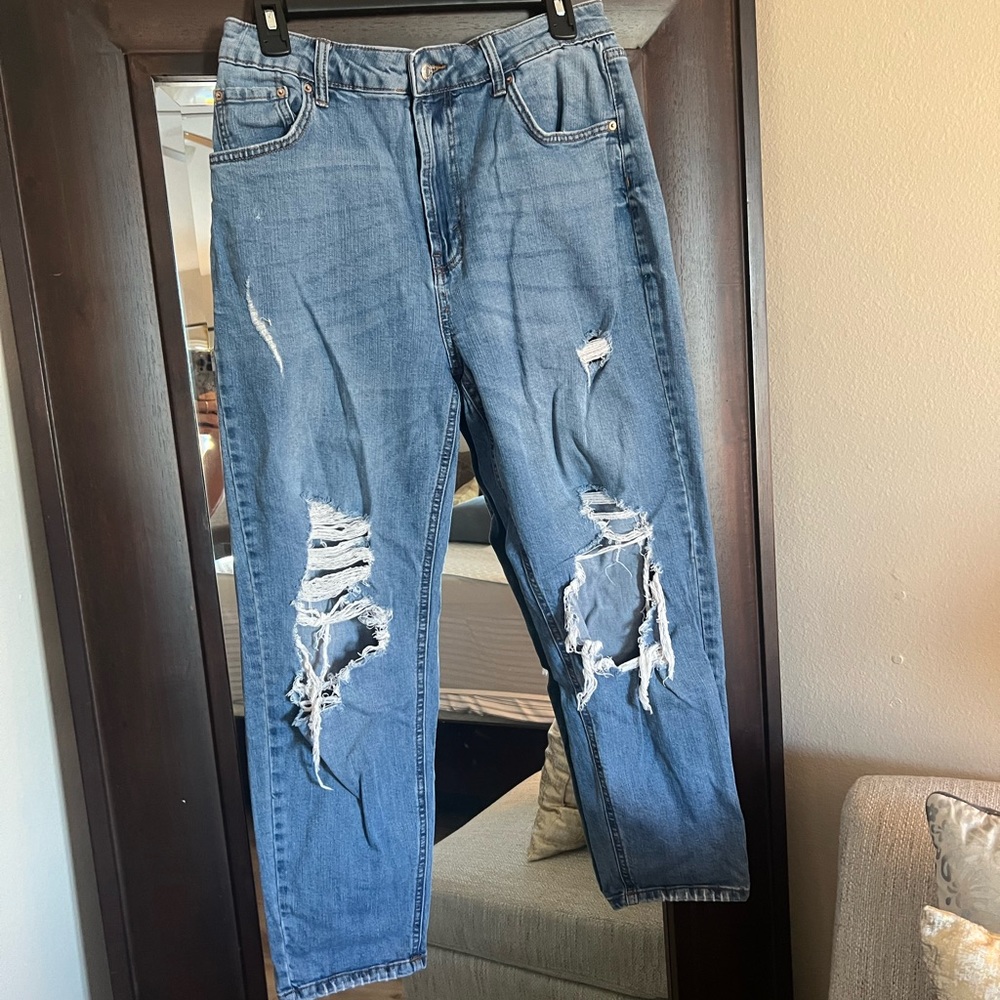 Ripped blue jeans size 12